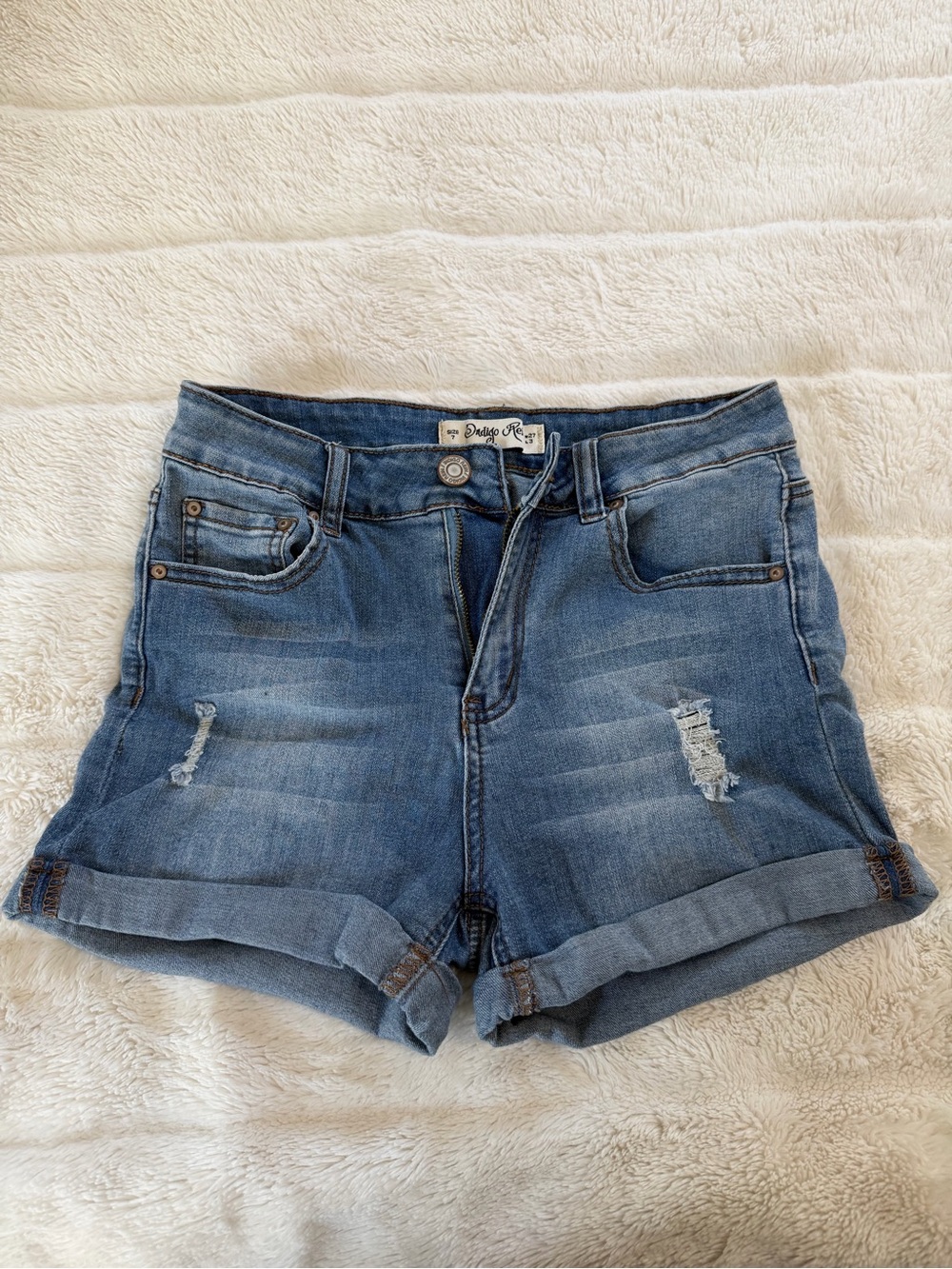 Indigo Rein Women's Blue Rolled-Hem Distressed Denim Shorts